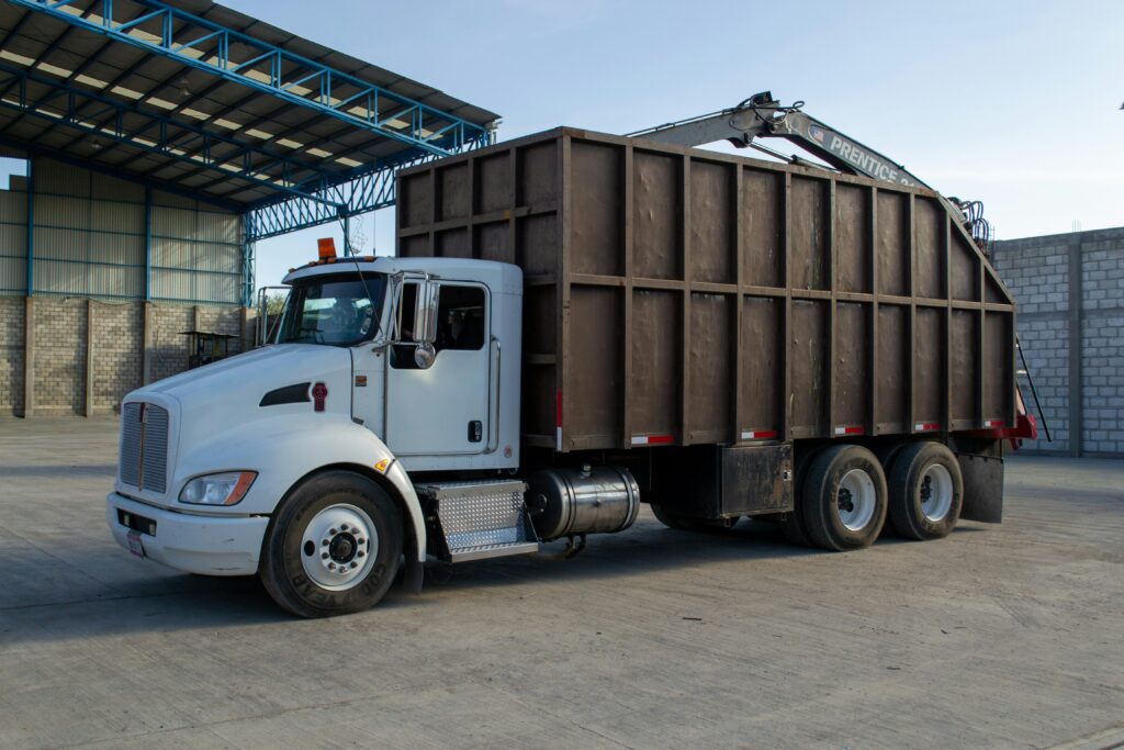 a truck parked in front of a warehouse