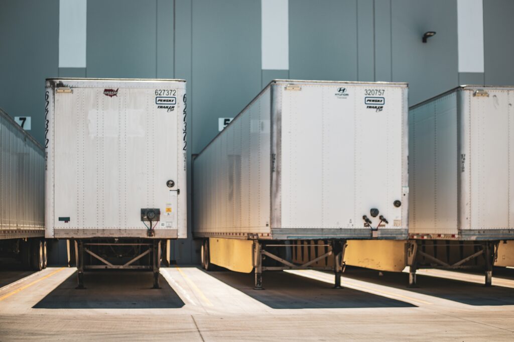 Trucks parked in a lot.