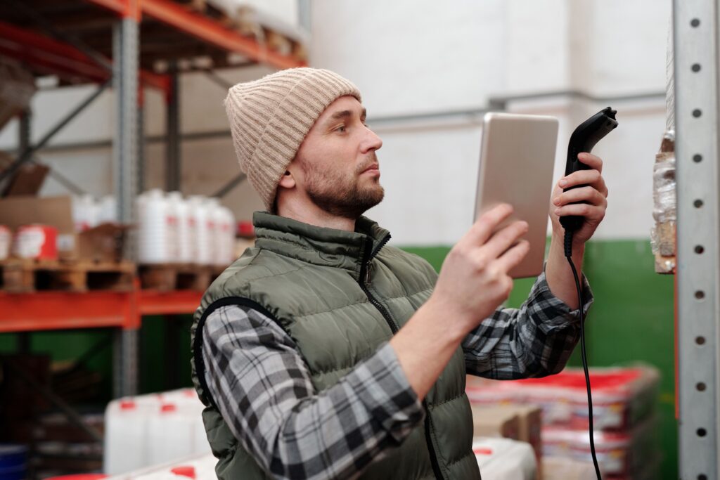 A warehouse worker managing inventory.